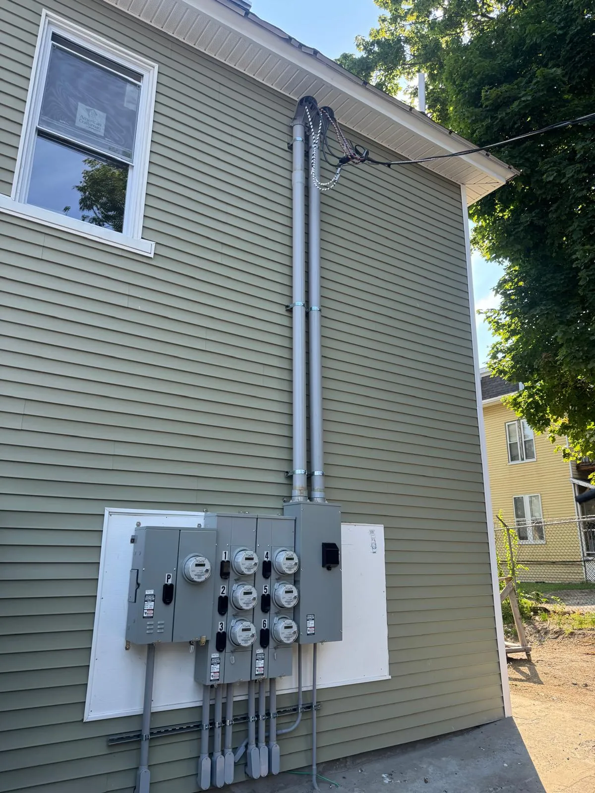 Exterior electric meter service upgrade by T Eagle Electrical in Waltham